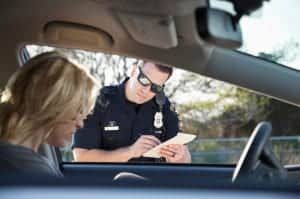 Police officer writing ticket