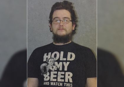 Beer T-Shirt Wearing Drunk Driver Crashes Into Graveyard.